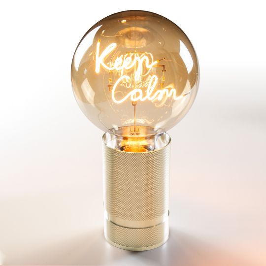 Tischleuchte mit Leuchtmittel in Glühbirnenform und Schriftzug 'Keep Calm'.