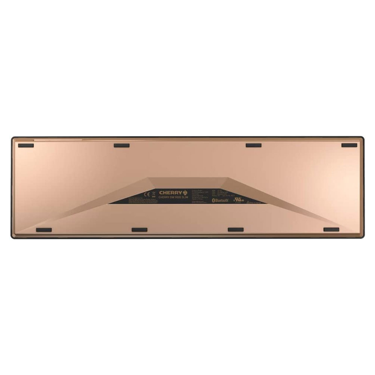 Rückseite einer CHERRY Tastatur in Roségold mit schwarzen Gummifüßen.